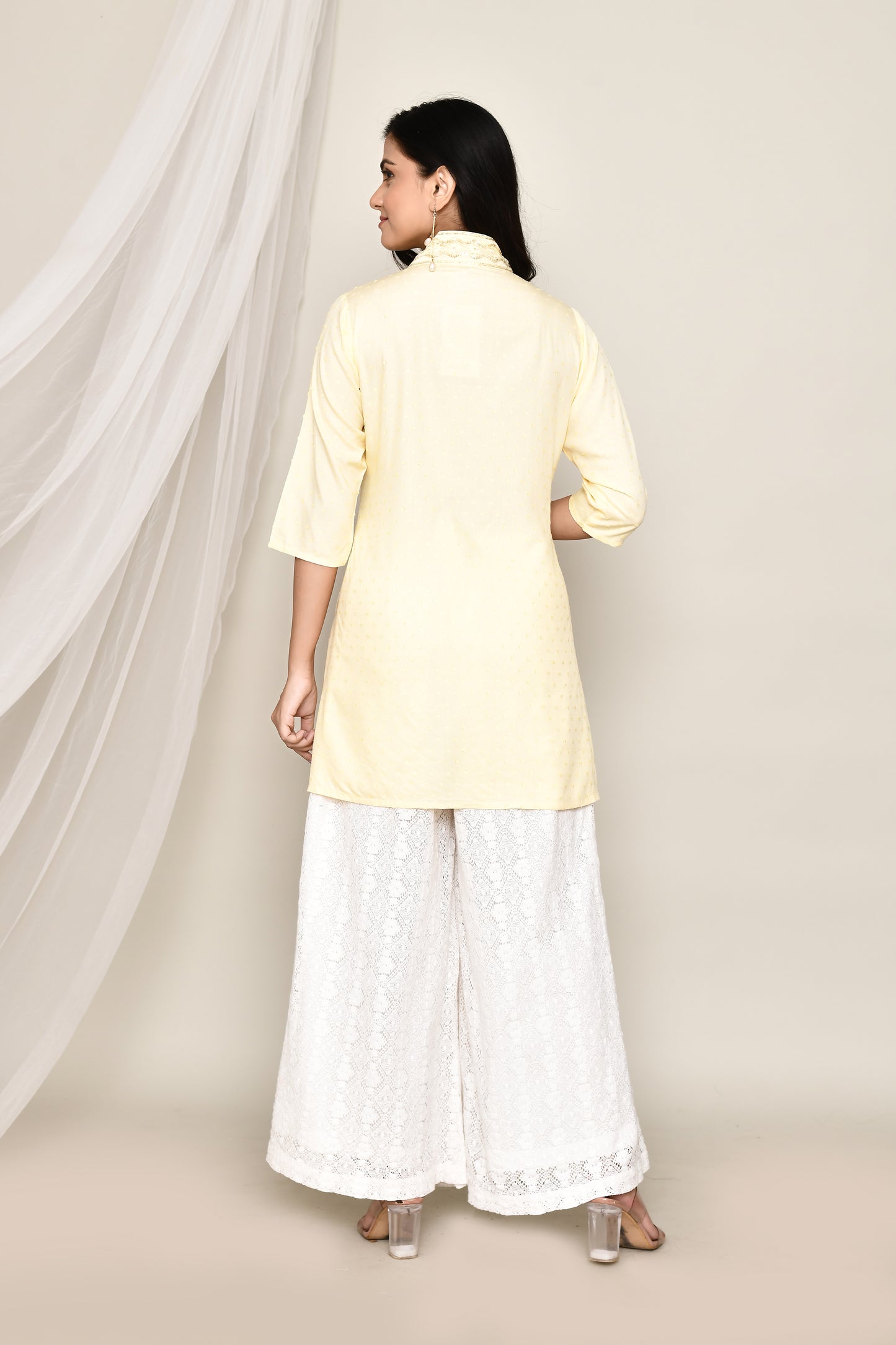 V- Neck Short Fancy Kurti With Neck Embroidery In Pastel Colour Palate