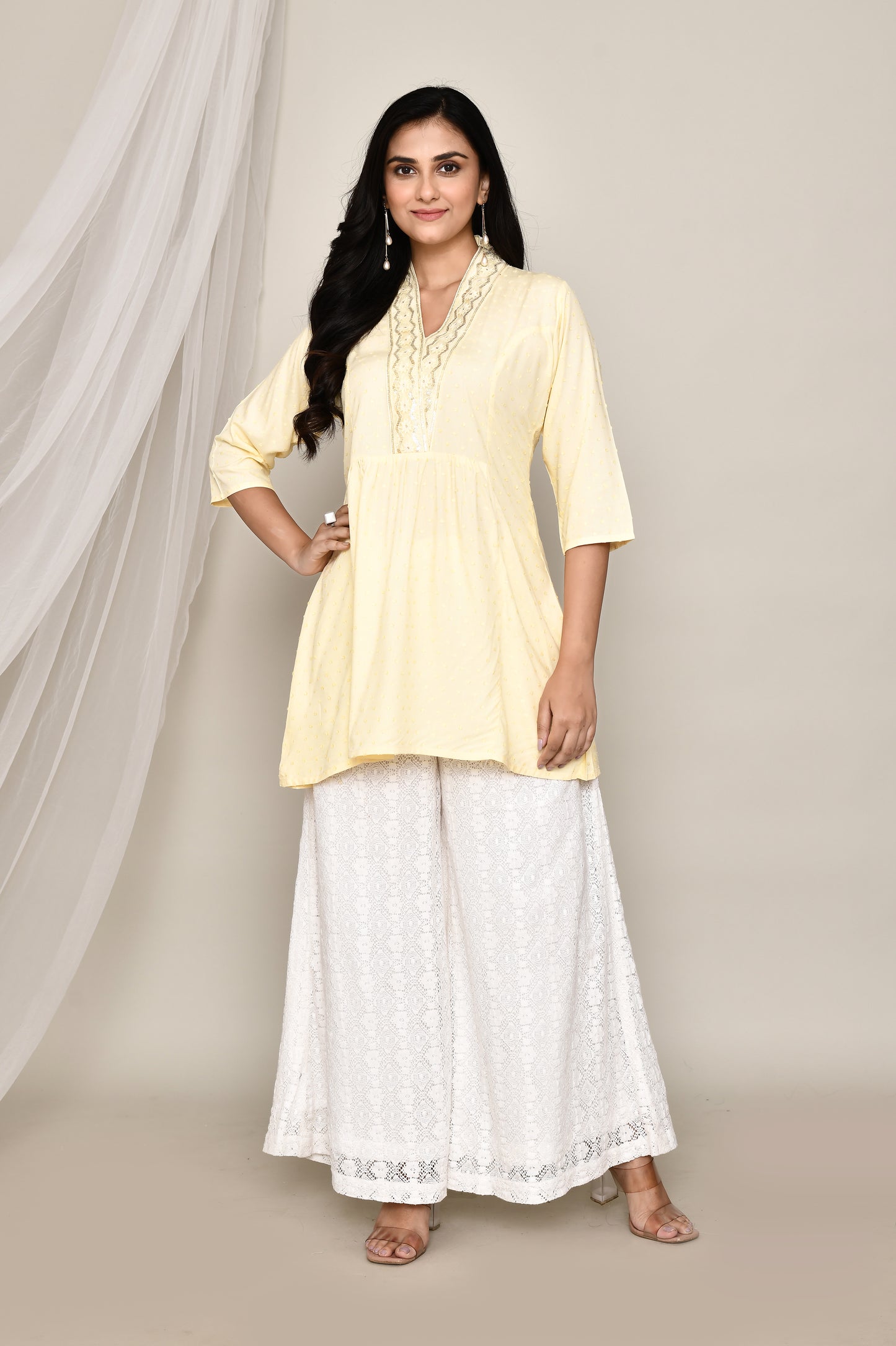 V- Neck Short Fancy Kurti With Neck Embroidery In Pastel Colour Palate