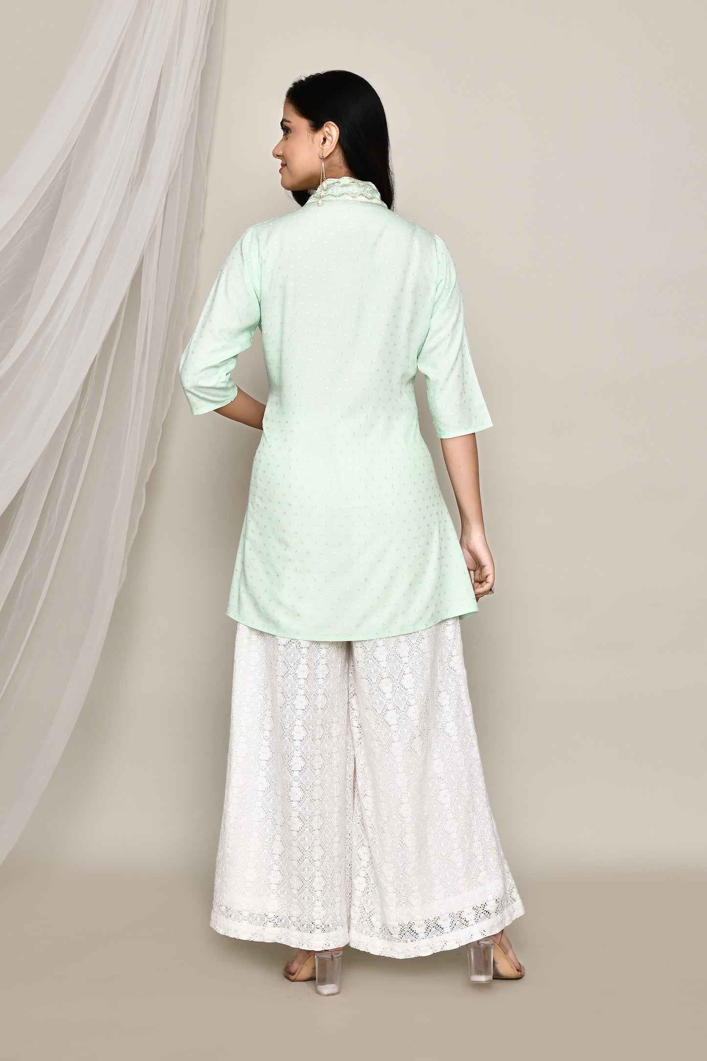 V- Neck Short Fancy Kurti With Neck Embroidery In Pastel Colour Palate