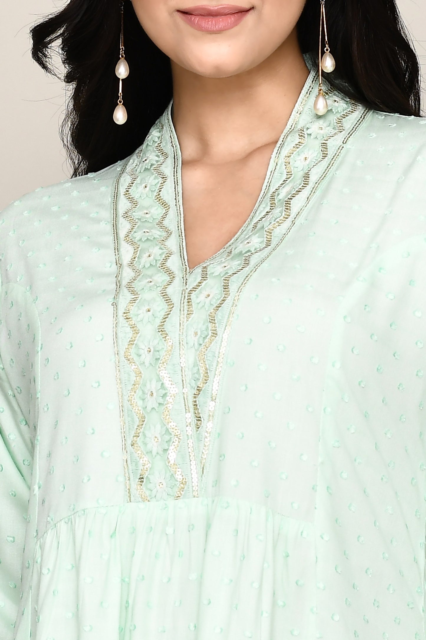 V- Neck Short Fancy Kurti With Neck Embroidery In Pastel Colour Palate