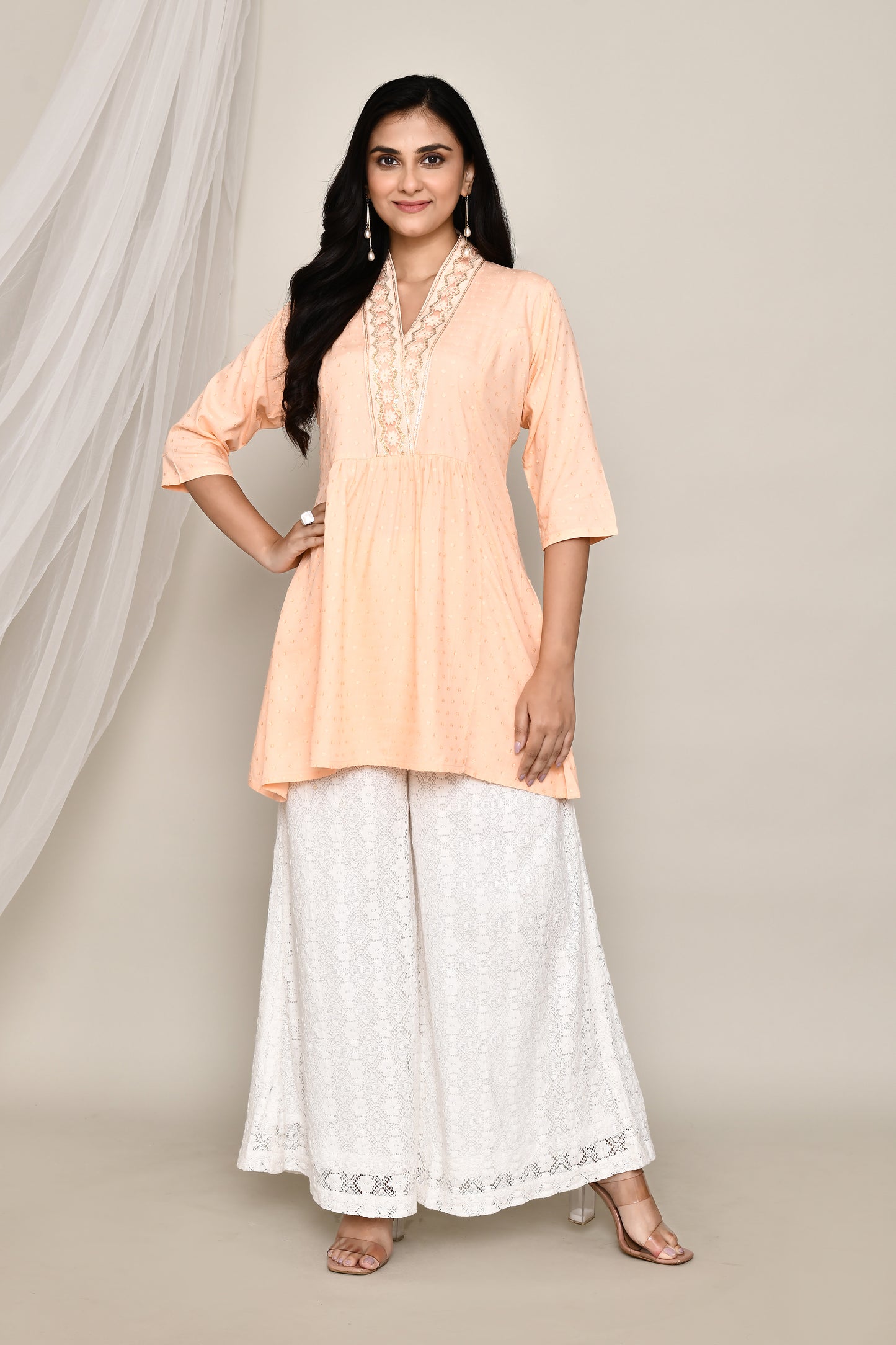 V- Neck Short Fancy Kurti With Neck Embroidery In Pastel Colour Palate